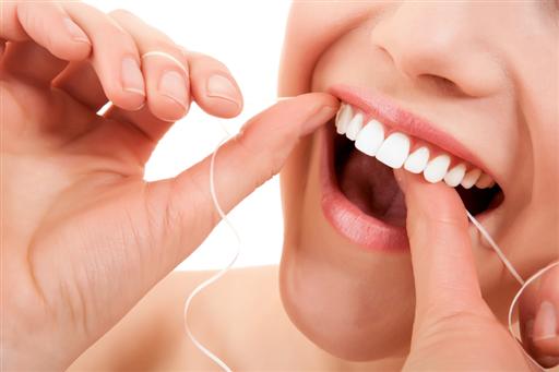 how to properly floss your teeth